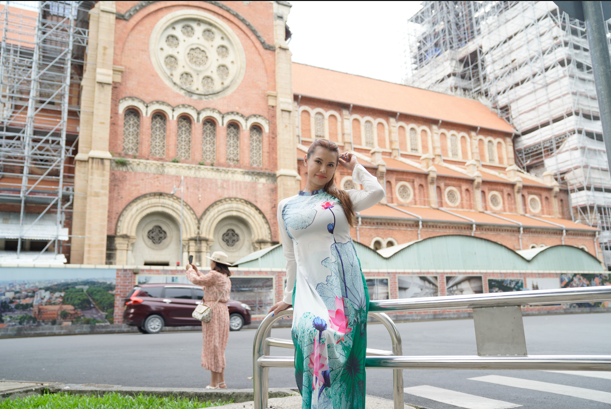 Maria Ozawa poses in front of the Pink Church in Ho Chi Minh City, Vietnm. Maria Ozawa Embraces Vietnamese Culture in Ao Dai While Exploring Ho Chi Minh City's Historic Gems